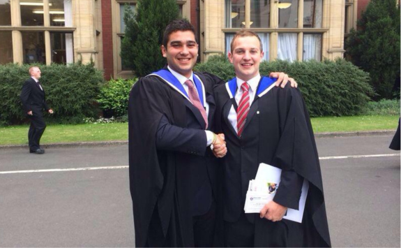 Hugh with a friend on graduation day